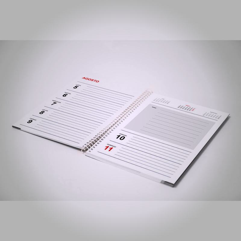 Agenda abierta con líneas para notas